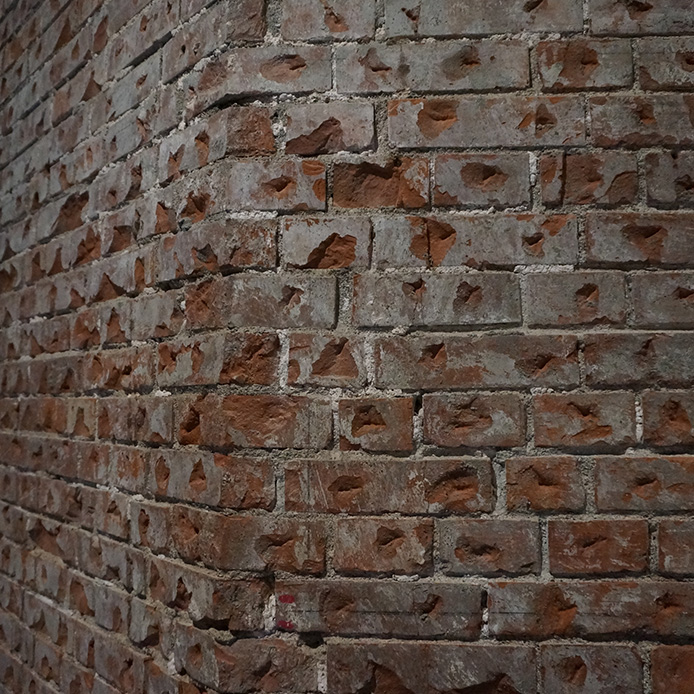 Roughening of the brick walls